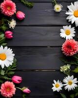 Summer flowers on wooden background photo