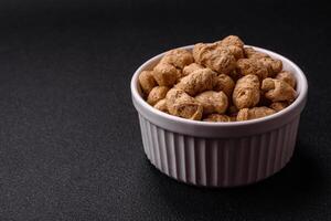 Dry soybean meat pellets, diet food for vegan and vegetarian cuisine photo