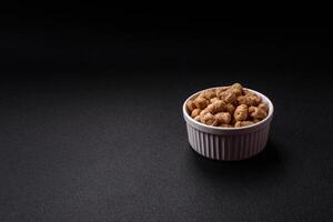 Dry soybean meat pellets, diet food for vegan and vegetarian cuisine photo