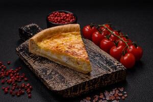 Delicious quiche with broccoli, chicken or salmon and cheese photo