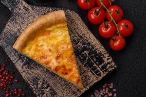 Delicious quiche with broccoli, chicken or salmon and cheese photo