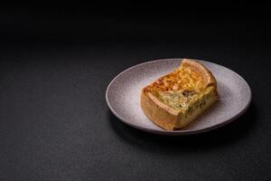 Delicious quiche with broccoli, chicken or salmon and cheese photo