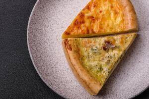 Delicious quiche with broccoli, chicken or salmon and cheese photo