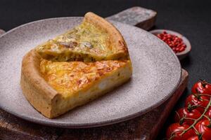 Delicious quiche with broccoli, chicken or salmon and cheese photo