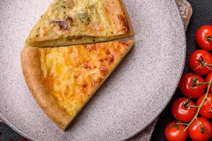 Delicious quiche with broccoli, chicken or salmon and cheese photo