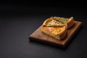Delicious quiche with broccoli, chicken or salmon and cheese photo