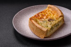 Delicious quiche with broccoli, chicken or salmon and cheese photo