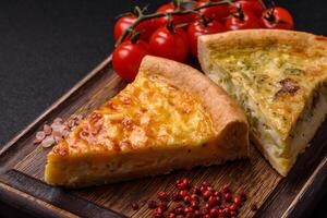 Delicious quiche with broccoli, chicken or salmon and cheese photo