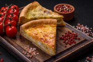 Delicious quiche with broccoli, chicken or salmon and cheese photo