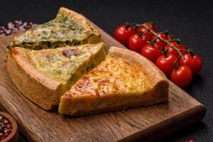 Delicious quiche with broccoli, chicken or salmon and cheese photo