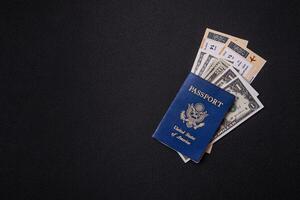 United States of America passport, airline tickets and money photo