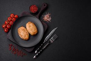 Delicious fresh fried minced cutlets with spices and herbs photo