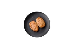 Delicious fresh fried minced cutlets with spices and herbs photo