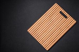 Empty rectangular wooden cutting board with copy space photo