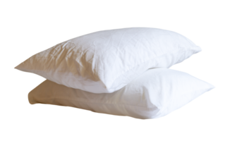 Side view of white pillows with pillow cases after guest use in hotel or resort room isolated with clipping path in file format png