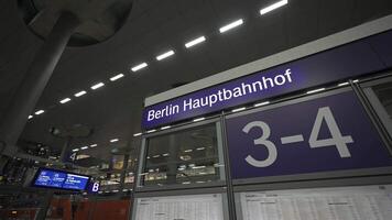 December 24, 2023. Berlin, Germany. Berlin hauptbahnhof gleis. Berlin Main Station Interior inside on platform. Central railway terminal inside on railroad tracks. Head railroad depot view of track. video