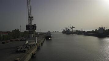 Porto, Portugal. Cargo port with cranes and workers in sunny weather in Oporto. Loading terminal with cargo ships view from the bridge. Global business logistic and transportation. video