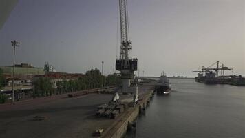 Porto, Portugal. Cargo port with cranes and workers in sunny weather in Oporto. Loading terminal with cargo ships view from the bridge. Global business logistic and transportation. video