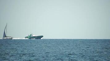 A high speed boat is sailing in the calm ocean. video