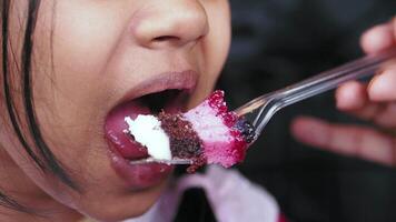 closeup of a child eating slice of a cafe video