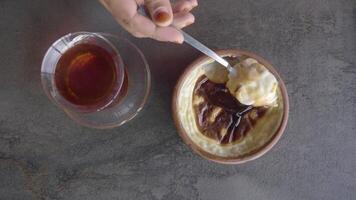 rice Caramel pudding in a glass jar on table video