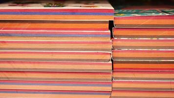 stack of books on wooden table video