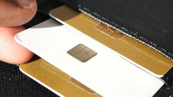 closeup of taking a card out from a wallet video