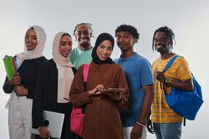 Group of diverse students engages in modern educational practices, utilizing a variety of technological tools such as laptops, tablets, and smartphones against a clean white background, exemplifying photo