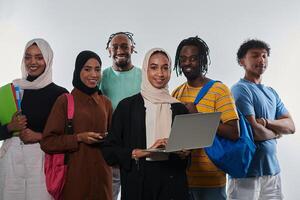 Group of diverse students engages in modern educational practices, utilizing a variety of technological tools such as laptops, tablets, and smartphones against a clean white background, exemplifying photo