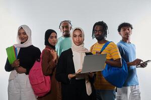 Group of diverse students engages in modern educational practices, utilizing a variety of technological tools such as laptops, tablets, and smartphones against a clean white background, exemplifying photo