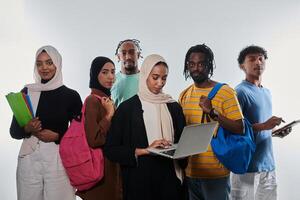 Group of diverse students engages in modern educational practices, utilizing a variety of technological tools such as laptops, tablets, and smartphones against a clean white background, exemplifying photo