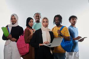 Group of diverse students engages in modern educational practices, utilizing a variety of technological tools such as laptops, tablets, and smartphones against a clean white background, exemplifying photo
