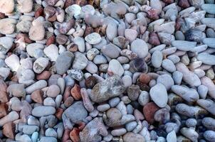 a pile of rocks and gravel in a field photo
