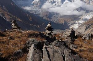 Stone cemetery at Annapurna Base Camp, Himalayas, Nepal photo