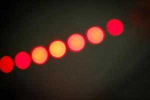 Defocused abstract background of red light in the night photo