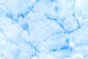 White clouds on blue sky, wallpaper and pattern background photo