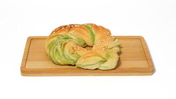 Indonesian bread stuffed with green beans isolated on white background. Selective focus photo