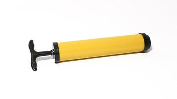 Yellow manual plastic vacuum pump isolated on white, the vacuum pump saves space in the trunk photo