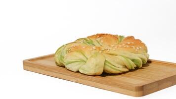 Indonesian bread stuffed with green beans isolated on white background. Selective focus photo