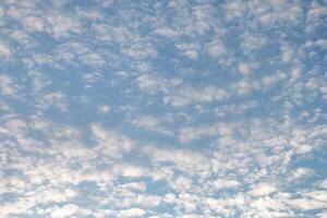 Blue sky with white clouds photo