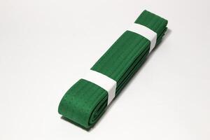 A picture of taekwondo belt on white background with selective focus photo