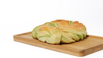 Indonesian bread stuffed with green beans isolated on white background. Selective focus photo