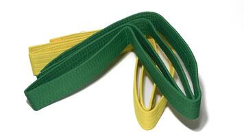 A picture of taekwondo belt on white background with selective focus photo