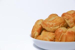 peanut almond cookies topped with sliced peanuts. photo