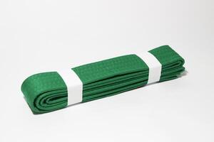 A picture of taekwondo belt on white background with selective focus photo
