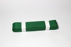 A picture of taekwondo belt on white background with selective focus photo