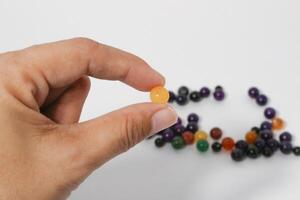Colorful Beads Background. Background pattern of multicolor beads.Palette of colors beads. photo