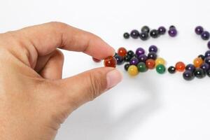 Colorful Beads Background. Background pattern of multicolor beads.Palette of colors beads. photo