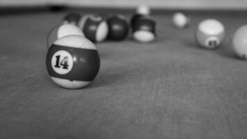 Billiards sports game. Multi-colored billiard balls with numbers on the pool table. Active recreation and entertainment. photo