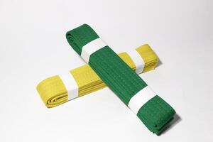 A picture of taekwondo belt on white background with selective focus photo